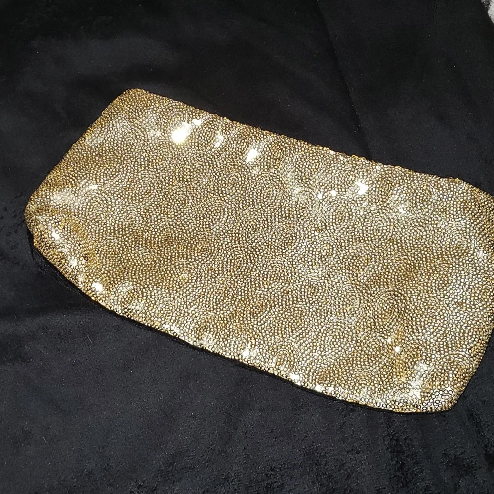 3/$20 Gold sequin makeup bag (new)